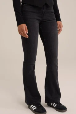 high rise flared jeans met stretch