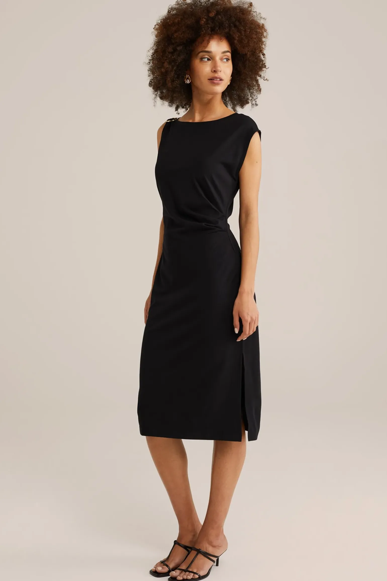 jersey jurk met gouden accenten