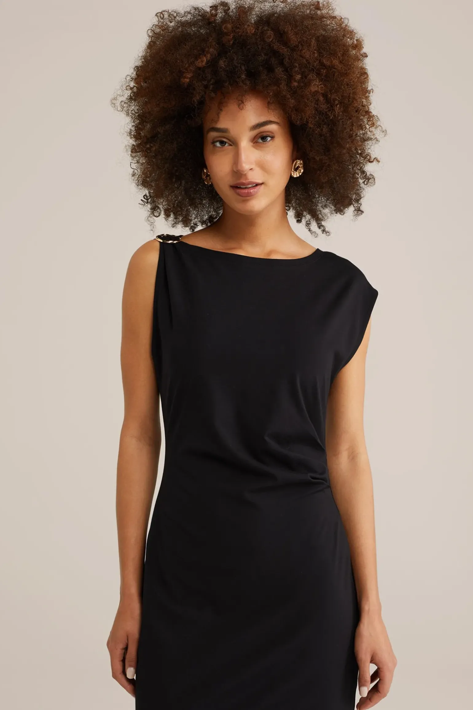 jersey jurk met gouden accenten