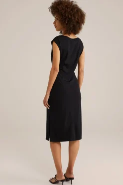 jersey jurk met gouden accenten