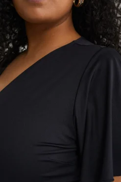 jersey jurk met overslaghals - Curve