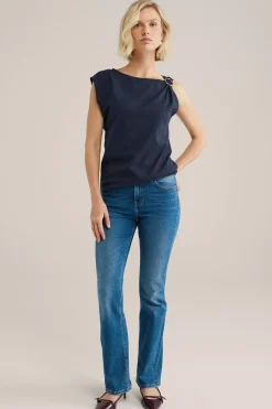 jersey top met gouden accenten