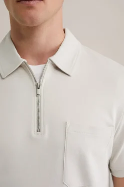 poloshirt met rits