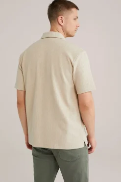 Relaxed fit polo met structuur