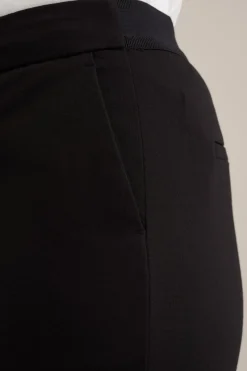 Slim fit flared pantalon met stretch
