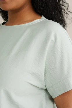 top met strikdetail - Curve