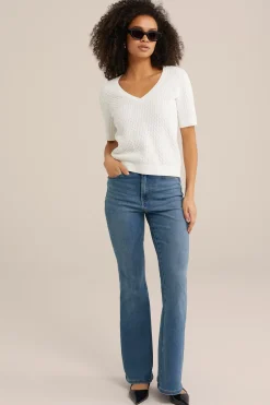 wide flared jeans met stretch