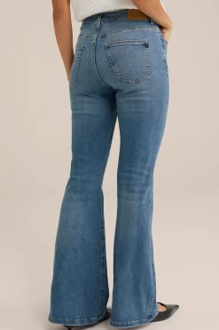 wide flared jeans met stretch